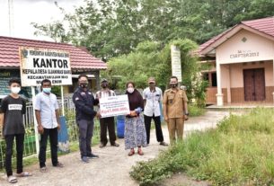 PTBA serahkan Bantuan Rumah Korban Banjir di Desa Ujan Mas Baru