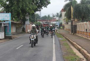 Kolonel Inf Romas Herlandes melaksanakan kegiatan olahraga sepeda santai