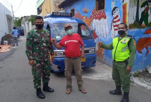 Anggota TNI Bantu Pemulangan Warga Usai Jalani Karantina di Asrama Haji Donohudan