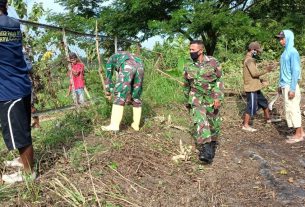 Satgas TMMD Kodim Bojonegoro Bersama Warga Benahi Saluran Air