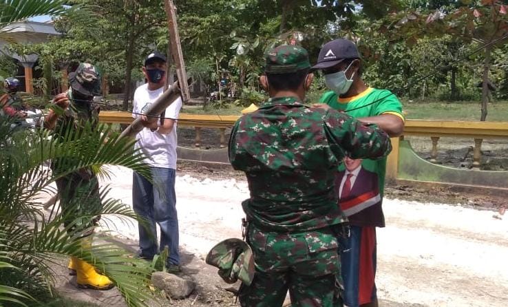 Jelaskan Program Fisik TMMD Kodim Bojonegoro, Satgas Dan Babinsa Komsos Dengan Warga