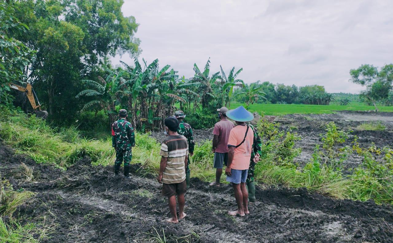 Kerjasama Dengan PU SDA, TMMD Bojonegoro Keruk Sungai Ngrancang