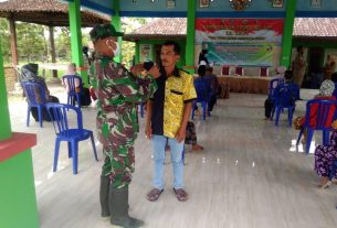 Giat Distribusi Bansos TMMD Bojonegoro, Tetap Terapkan Protokol Kesehatan