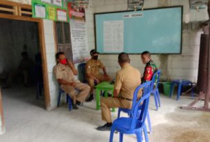 Duduk Bareng, Danki Satgas TMMD Bojonegoro Komsos Dengan Perades Jatimulyo