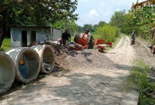 TMMD Bojonegoro Lanjutkan Pengerjaan Drainase Desa Jatimulyo