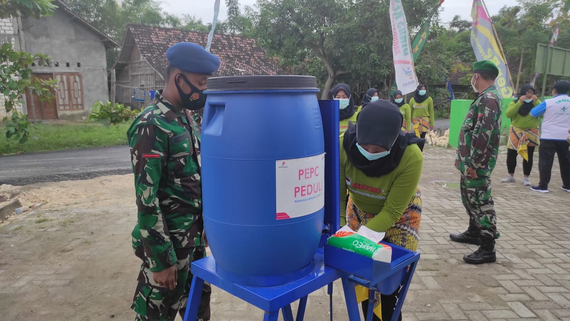 Dilokasi TMMD Bojonegoro Satgas Ketatkan Disiplin Protokol Kesehatan