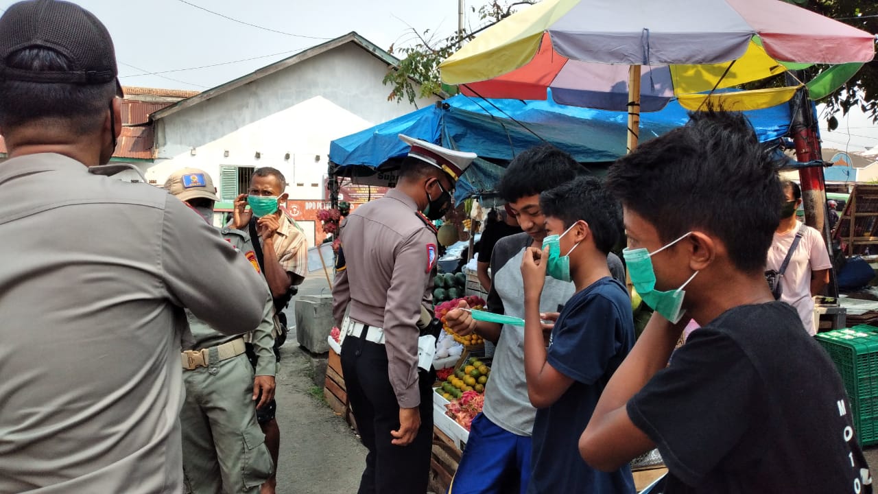 Wakapolres Tanggamus Pimpin Operasi Yustisi dan Bagi Masker Hari Kesiapsiagaan Bencana