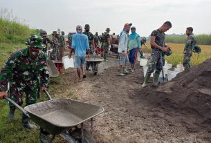 Selesai Apel Pagi Satgas TMMD Dan Masyarakat Segera Operasionalkan Peralatan Kerja