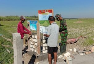 Prasasti TMMD Dibuat diTitik Awal Masuk Jalan Pembangunan TMMD