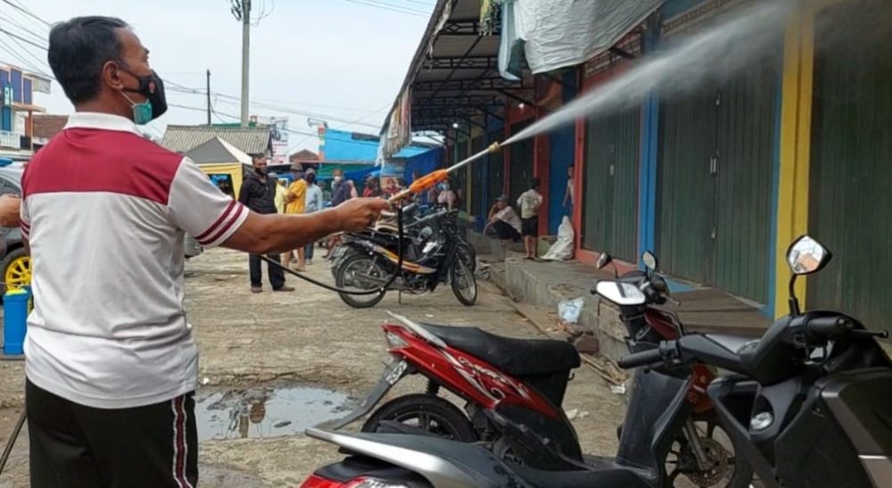 Polres Tanggamus Desinfeksi Pasar Wonosobo