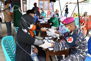 KORPS MARINIR TNI AL KEMBALI GELAR VAKSINASI TAHAP KEDUA KEPADA MASYARAKAT DISTRIK AIMAS KABUPATEN SORONG