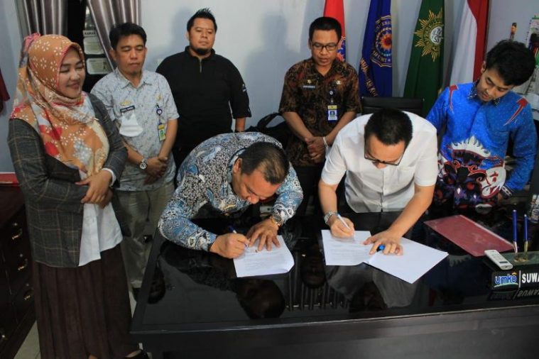 Diskominfo Lampura Lakukan Penandatanganan MOU Dengan UMKO