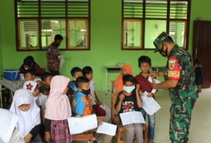 Serbuan Vaksinasi Covid 19 Koramil 410-01/Panjang Menyasar Madrasah Ibtidaiyah Mathlaul Anwar