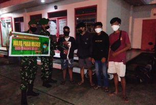 Anggota Koramil Terus Berikan Himbauan Pentingnya Protkes Kepada Warga Baik Siang Maupun Malam Hari