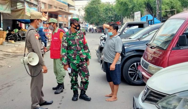 Babinsa Koramil 410-02/TBS Laksanakan Komsos dan Imbau Warga Patuhi Prokes