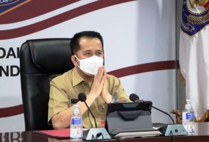 (Plh.) Direktur Jenderal (Dirjen) Bina Keuangan Daerah (Keuda) Kemendagri Agus Fatoni saat memberikan sambutan mewakili Menteri Dalam Negeri (Mendagri) Muhammad Tito Karnavian