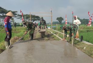 Dikebut, Rabat Beton Jalan barat Lapangan Tawang desa Tawang Kec. Weru telah mencapai 60%