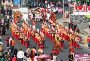 Pemprov Lampung Gelar Kirab Marching Band dan Pawai Kendaraan Hias, Gubernur Lampung dan Ketua PDBI Ikuti Pawai Kendaraan