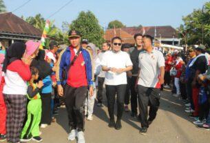 Ardian Saputra Ramaikan Jalan Sehat dan Senam Masal di Kecamatan Tanjung Raja
