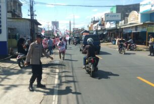 Polres Way Kanan Berikan Pam Kampanye di Jalinsum Baradatu