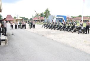 Polres Tulang Bawang Gelar Patroli Sinergitas Dengan TNI Pada Tahap Pungut Suara Pemilu 2024