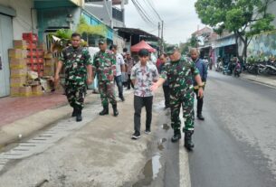 Sasaran Non Fisik TMMD Sengkuyung Tahap I Kodim 0735/Surakarta Bagikan 100 Paket Sembako