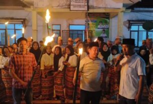 Perintahan pekon tanjung Kemala selain pasang obor ada kan ngekuh muli mehkanai