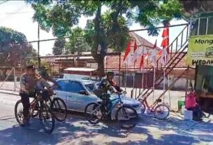 Dengan Bersepeda, Babinsa Purwosari Bersama Bhabinkamtibmas Laksanakan Patroli Kamtibmas di Wilayah Binaan