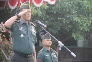 Prajurit dan PNS Kodim 0410/Kota Bandar Lampung Laksanakan Upacara Bendera