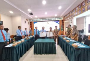 Penandatanganan Perjanjian Kerjasama Antara Kejari Lampura dengan Disperkimcaptaru