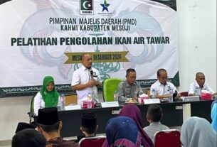 KAHMI Mesuji melaksanakan kegiatan pemberian santunan anak yatim