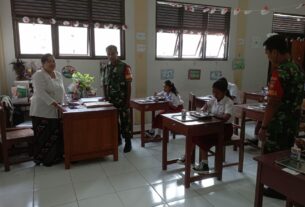 ”TNI Siap Mendukung Penuh Program Pemerintah” Babinsa Jagalan Bantu Pendistribusian Makanan Bergizi