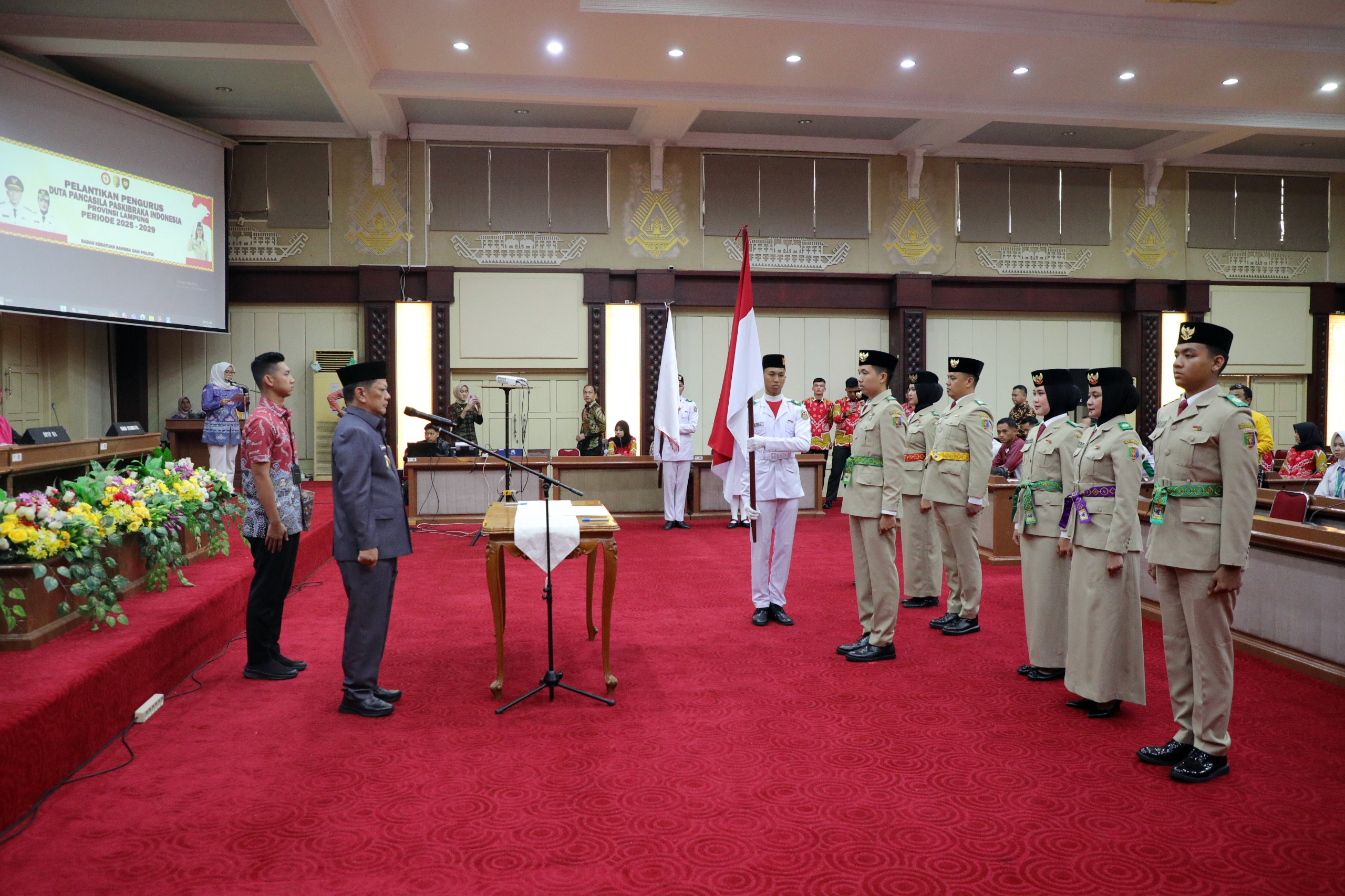 Pj. Sekdaprov Firsada Lantik Duta Pancasila Paskibraka Indonesia Tingkat Provinsi Lampung Periode 2025-2029