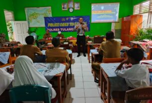 Kasat Lantas Polres Tulang Bawang Paparkan Materi dan Tujuan Digelarnya Police Goes To School di SD Negeri 2 Wonorejo